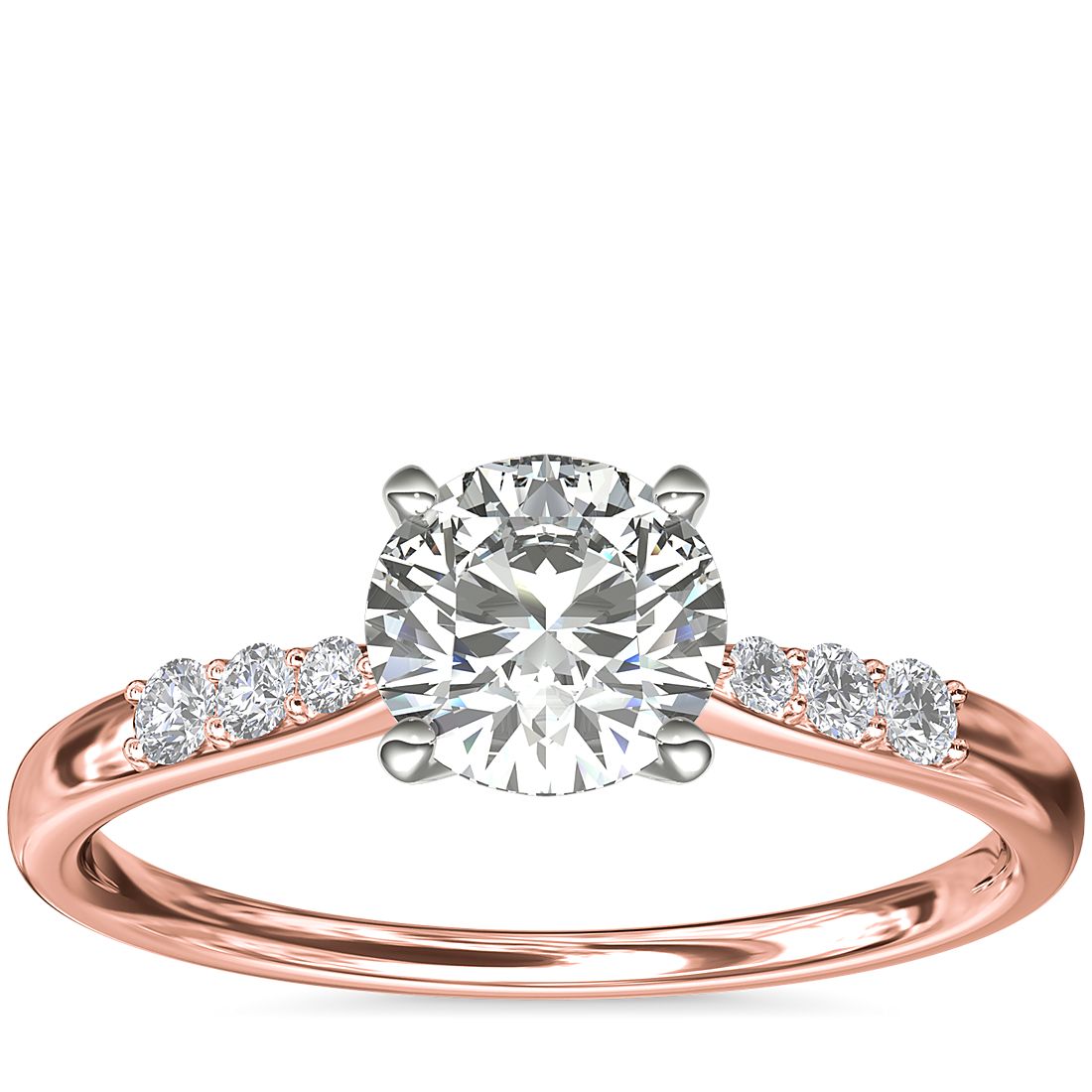 Anillo de compromiso de oro rosado con un diamante redondo de 1 quilate.